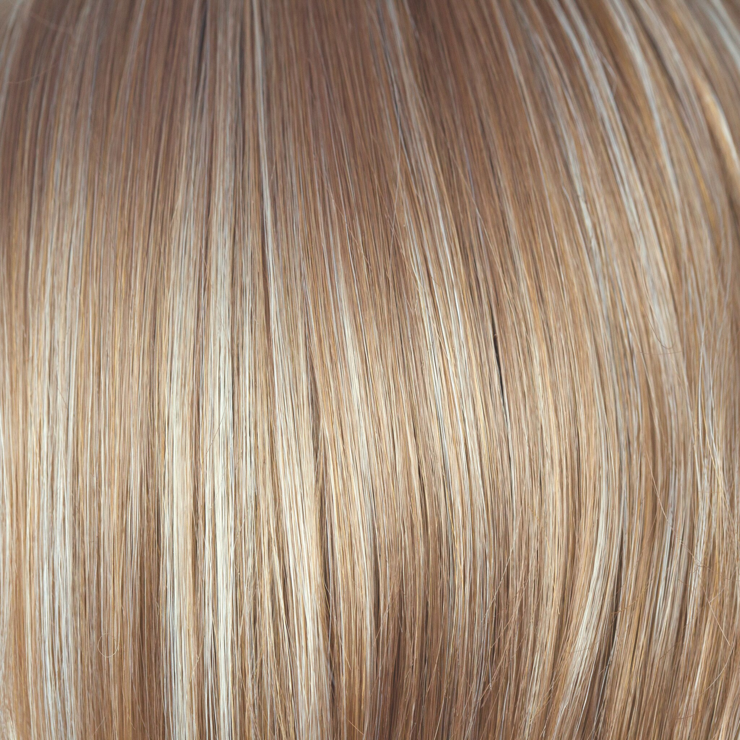 Chai Cream - A light blonde color packed full of slices of golden ivory, very light pearl blonds offset with butterscotch beiges that lift your face. A beautiful complementary shade of blond.