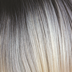 Creme de Coco - Pale cream and dark coco in contrast with one another, a fantastically dark root which then transverses into the cream coconut and whitey blond ash tones. Creme de Coco is an uber, cool color which maximizes fashion flair. It is one of our high heat colors.