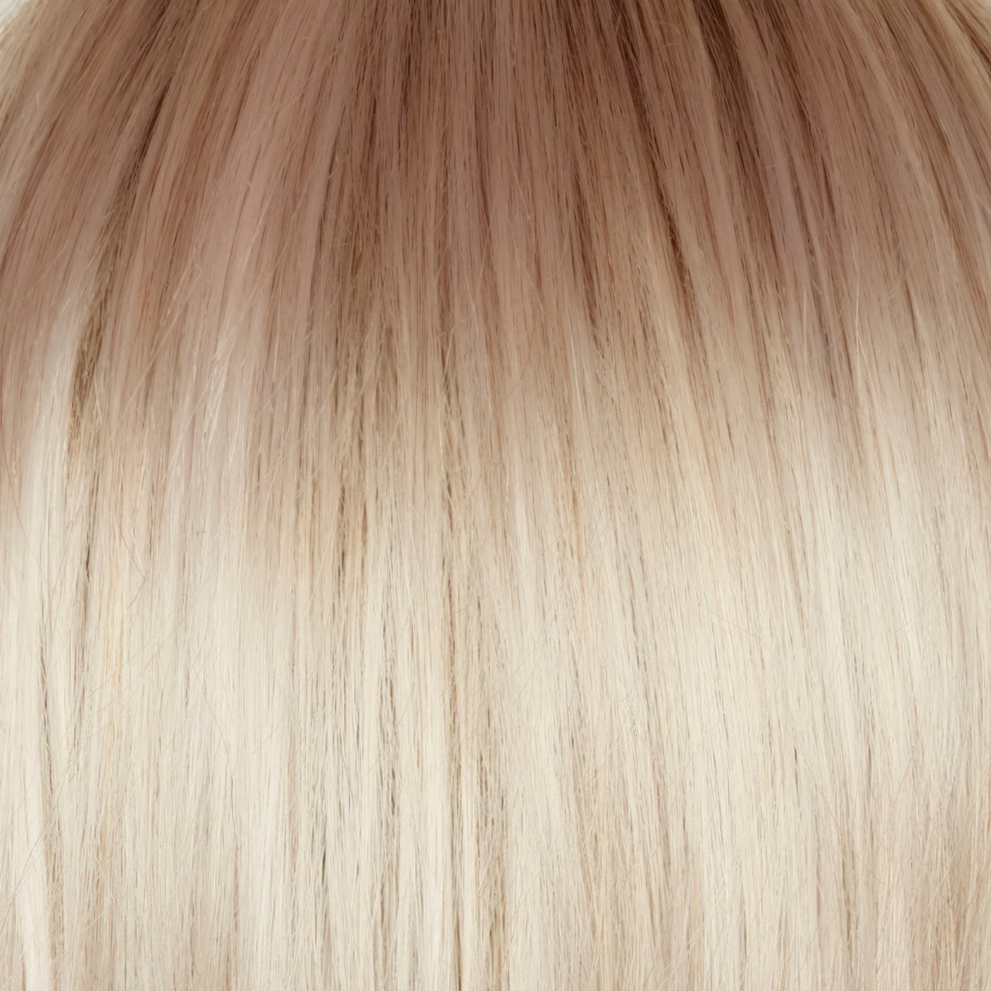 Ghost Blond-R - The rooted sister of the stunning hair color ‘Ghost Blond’. This color has a medium neutral blond root regrowth which transfers into a pearl cream blond . The unique platinum blond undertones give this color a distinctive and eye-catching appearance
