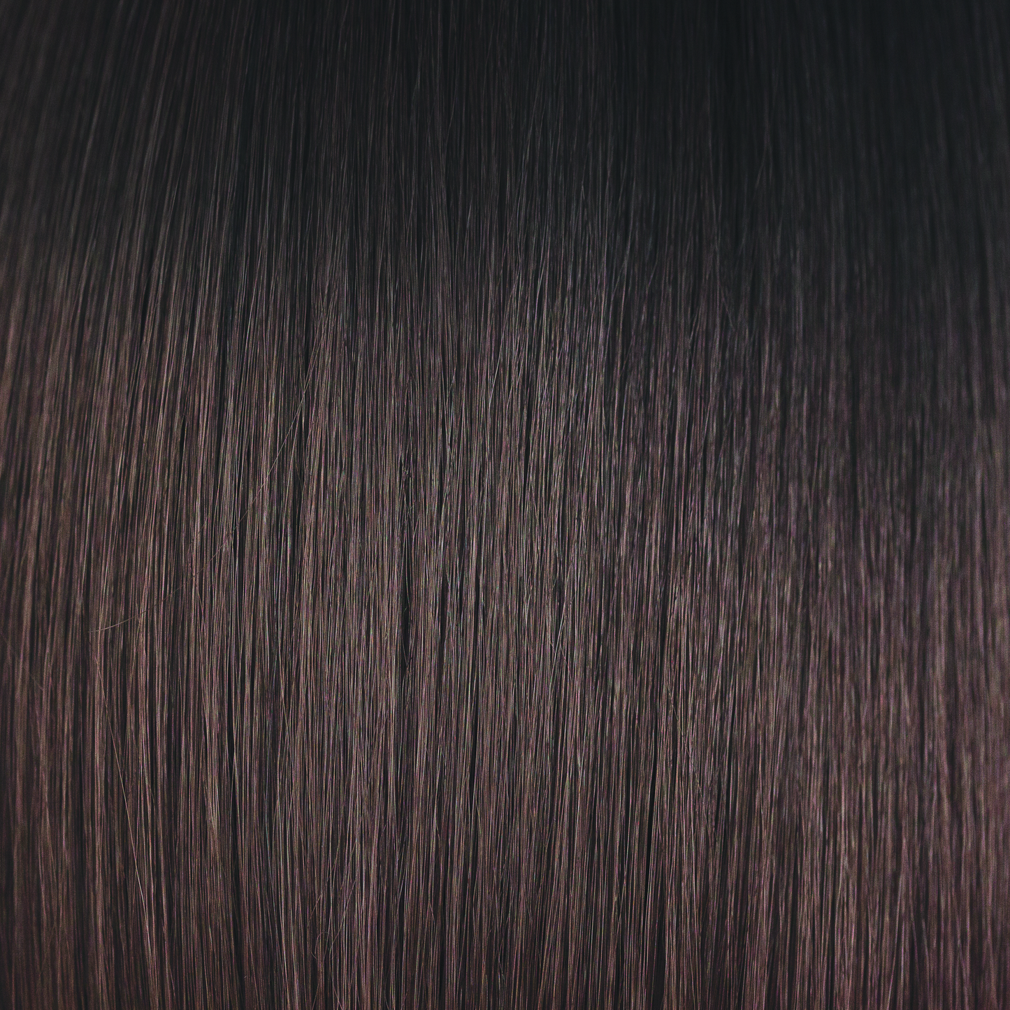 Hot Chocolate - An expensive looking color is a dark brown with a subtle blend of dark chocolate and milk chocolate tones, while maintaining a natural regrowth which keeps this color looking very realistic. Hot Chocolate is one of our high heat colors.