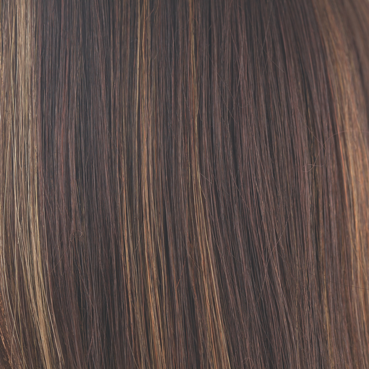 Java Frost - Warm Cappucino-based with a mix of reddish brown and medium golden blond highlights. Java Frost's highlights create a polished, dimensional look with subtle lightening.