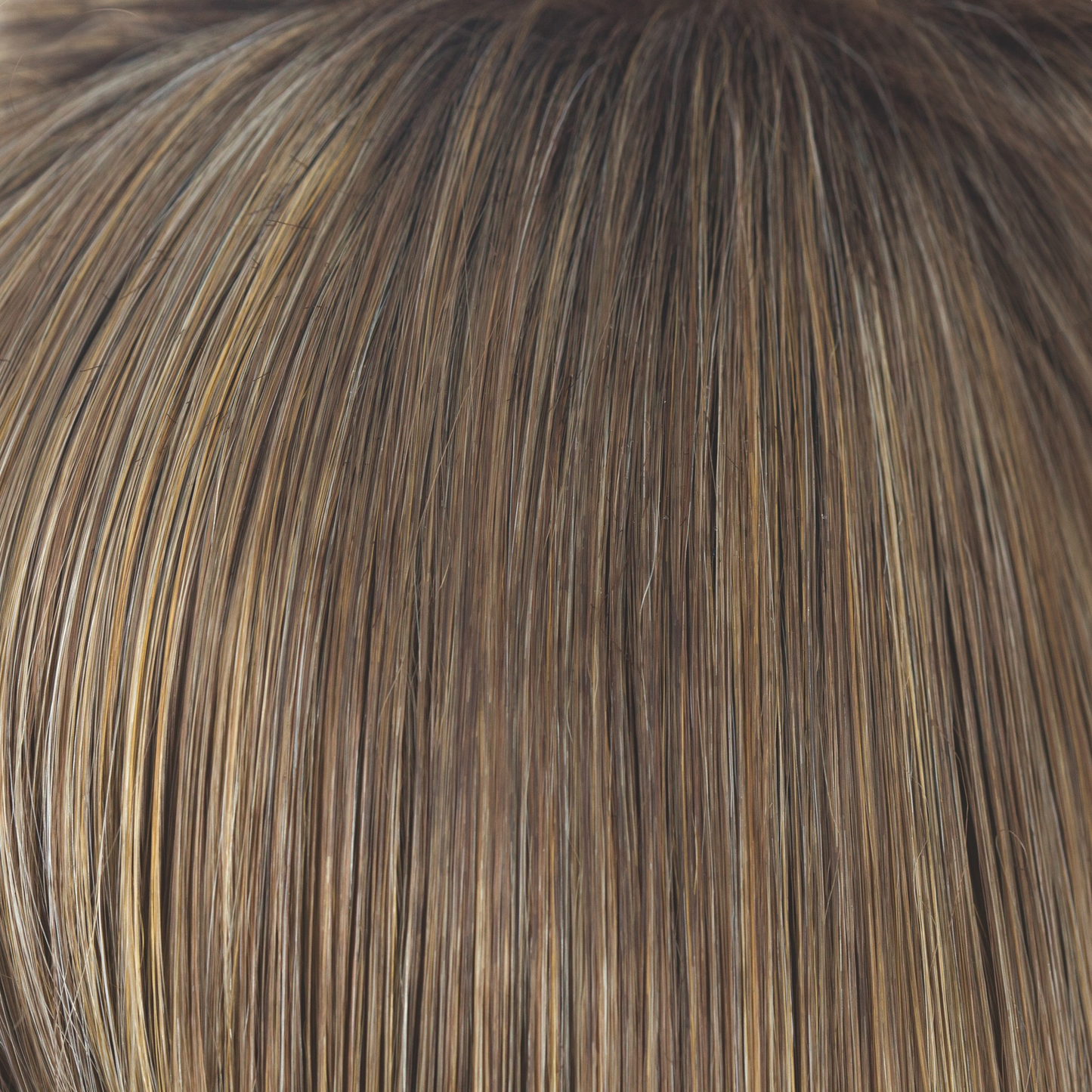 Mochaccino-R - This rooted dark blond color has highlights of cream and icy coconut with a slight undertone of chocolate. Mochaccino-R is natural looking with a regrowth, making this color so irresistible!