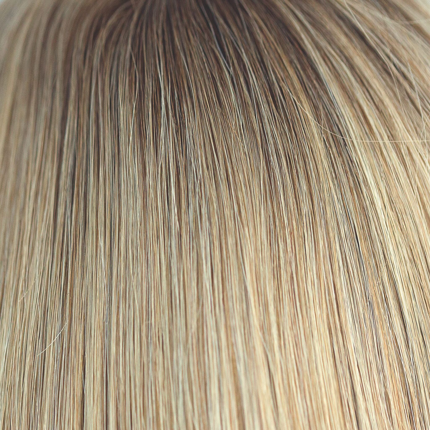 Moonlight Blonde Root - The perfect mixture of warm medium blond and cool light blond. The medium brown roots provide a natural burst of color, that's both defined and classy!
