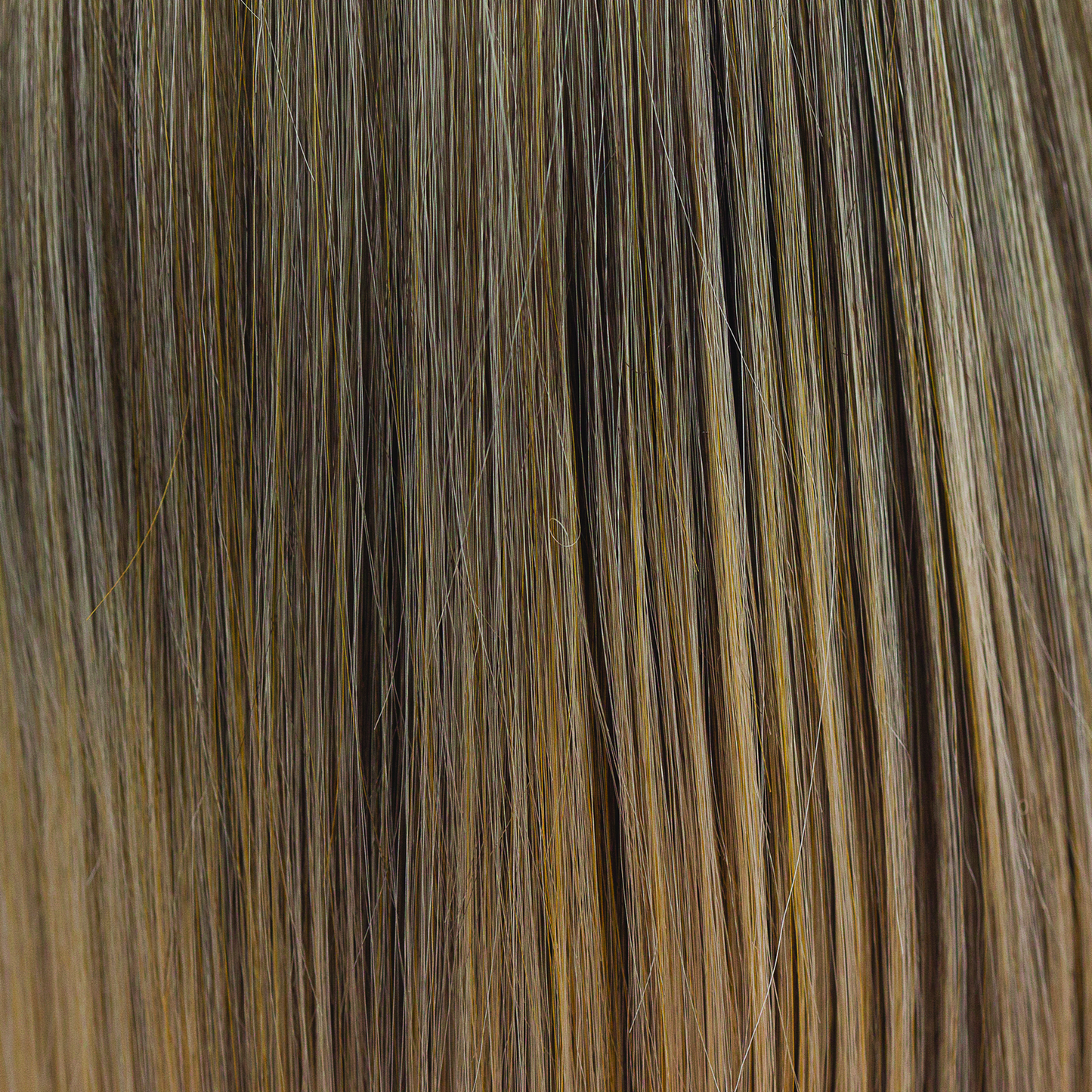 Buttered Toast  -  A medium blond smoky infusion of colors! Buttered Toast has a graduated blend of sandstone blonds and soft truffle weaves, with dark beige blond slices and buttery blended undertones.