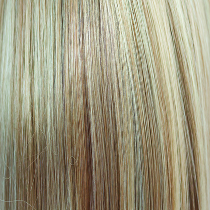 Champagne Blush  -  A very natural but very interesting champagne honey blond with tones of toffee and buttermilk subtlety getting lighter towards the ends. Champagne Blush is a decedent and flattering tone very wearable.