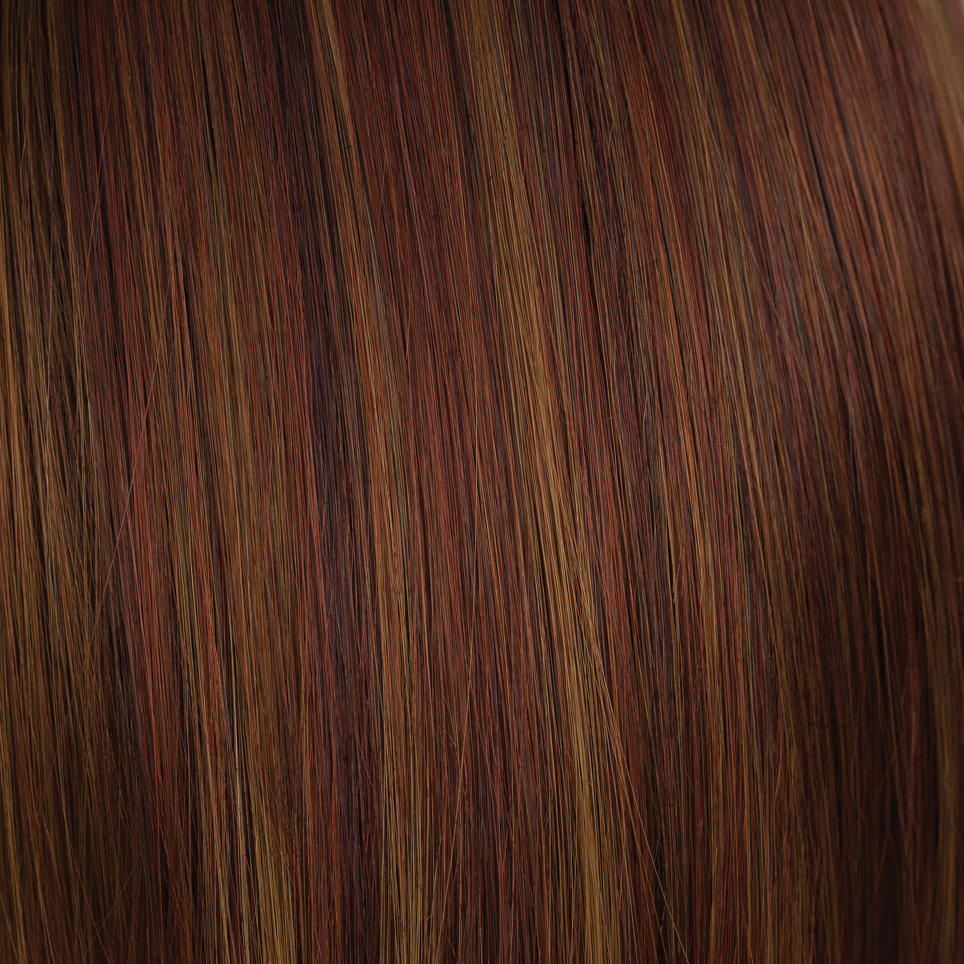 Cinnamon Swirl  -  From the chocolate, dark red base with flattering woven slices of teak, paprika, cinnamon and soft wheat dark blonds. Fantastic and beautiful! Cinnamon Swirl will put you in a spin!