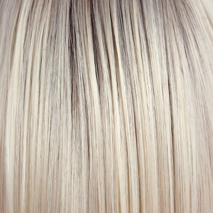 Coco Cream  -  A rich dark chocolate base that pushes the boundaries with its stunning displays of lily white chunky blond weaves and pale natural ash blond slices. Maximizing the impact of the style!